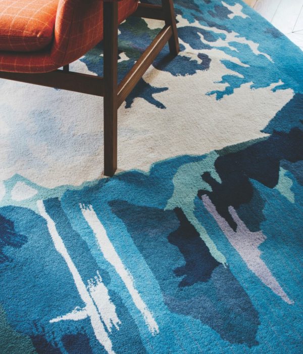 Office rug timber flooring desh shelving chairs retro